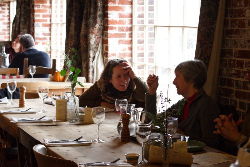 Susanna Sait on the left chatting to a friend