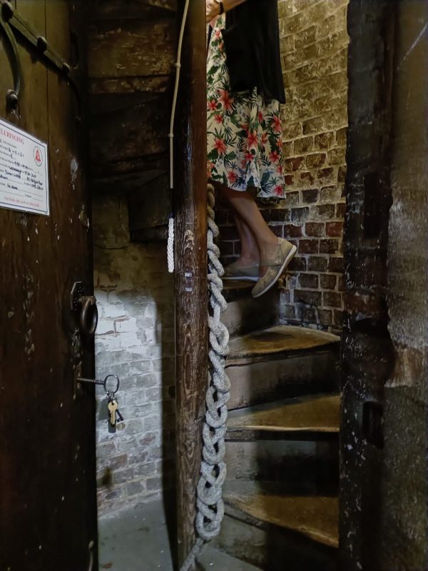 Marion Quemby begins the ascent of the 39 steps that lead to the belfry