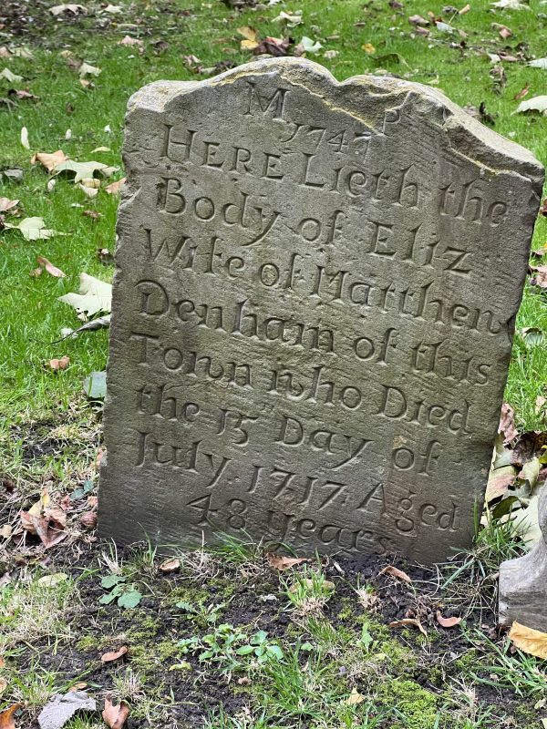Despite a forgivable lurch, this 300-year-old gravestone from 1717 reads clearly
