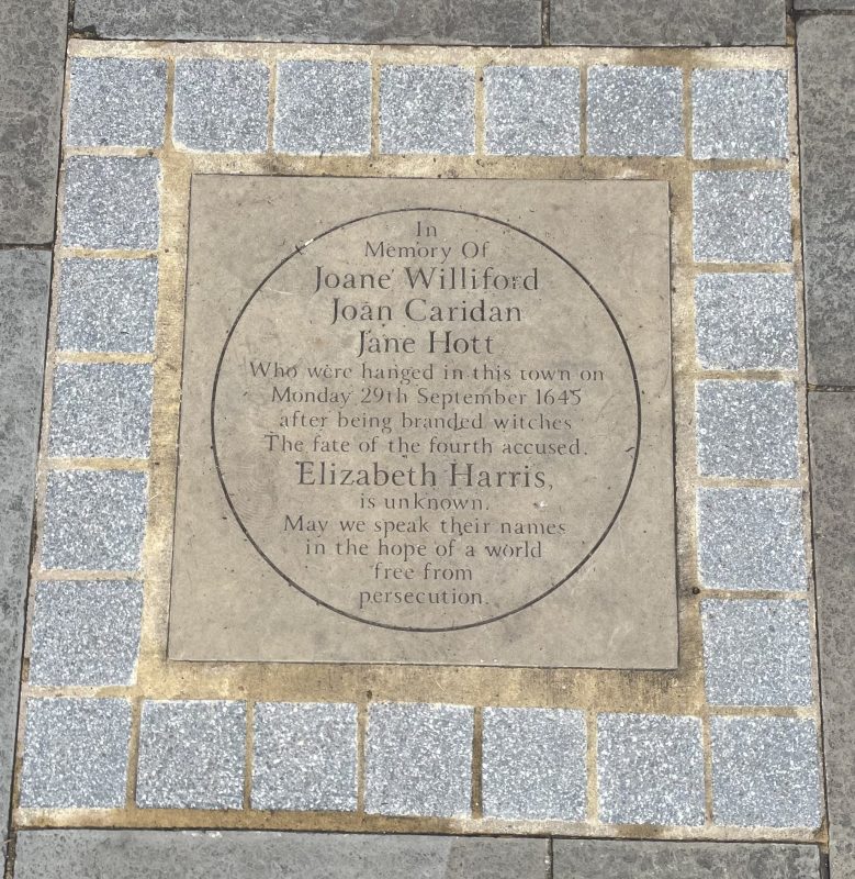 The memorial stone to the Faversham Witches laid near The Guildhall in Faversham