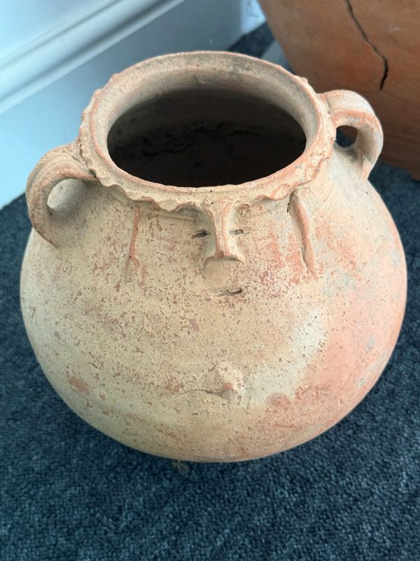 A Roman cremation 'face pot' from the Syndale Roman cemetery
