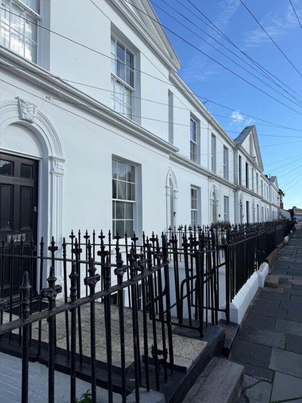 The charming Neptune Terrace faces inland from the sea wall