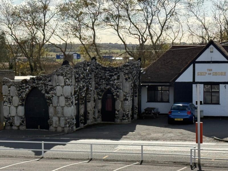 The Ship on Shore with attached grotto. There is a story that a ship full of barrels was wrecked here. The locals believing the barrels to be full of whisky rushed out to retrieve them. Finding them instead to be full of hardened cement, they used them to build this pub and grotto