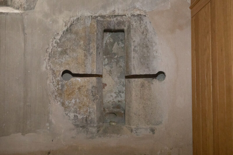 The cruciform 'squint' in the North transept of St Mary of Charity, Faversham