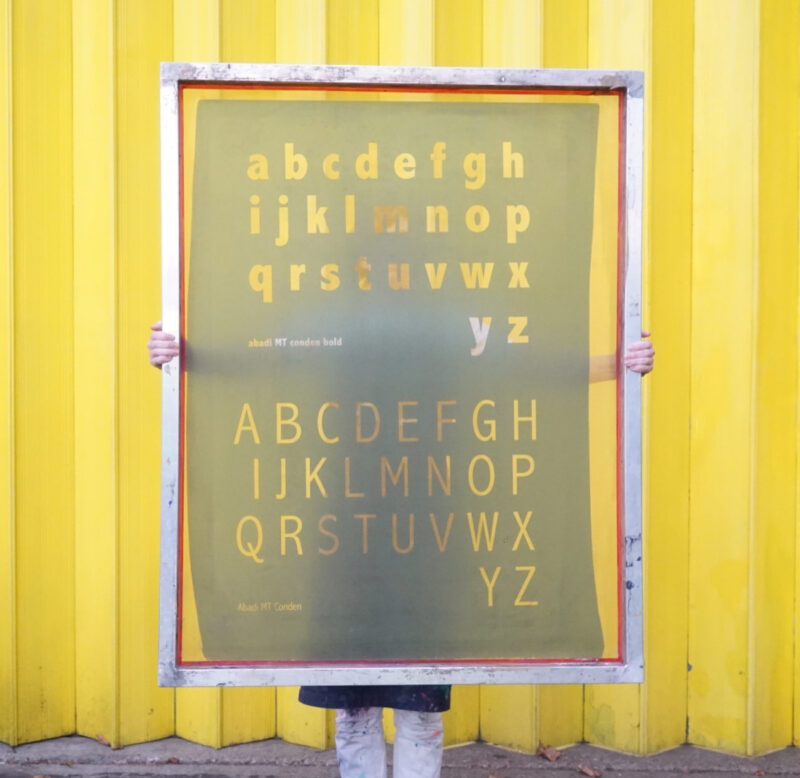 Sarah holding up a silk screen